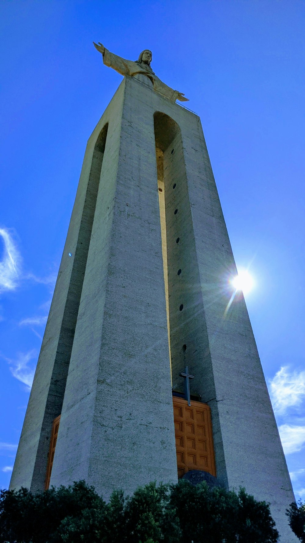 gray concrete building under blue sky during daytime