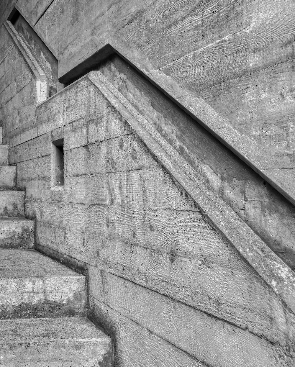 grayscale photo of concrete stairs