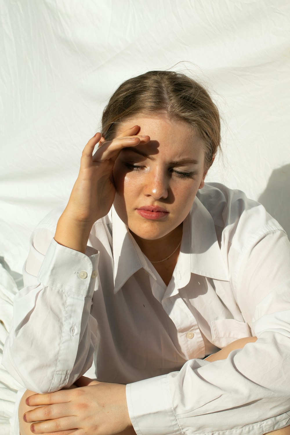 woman in white button up shirt