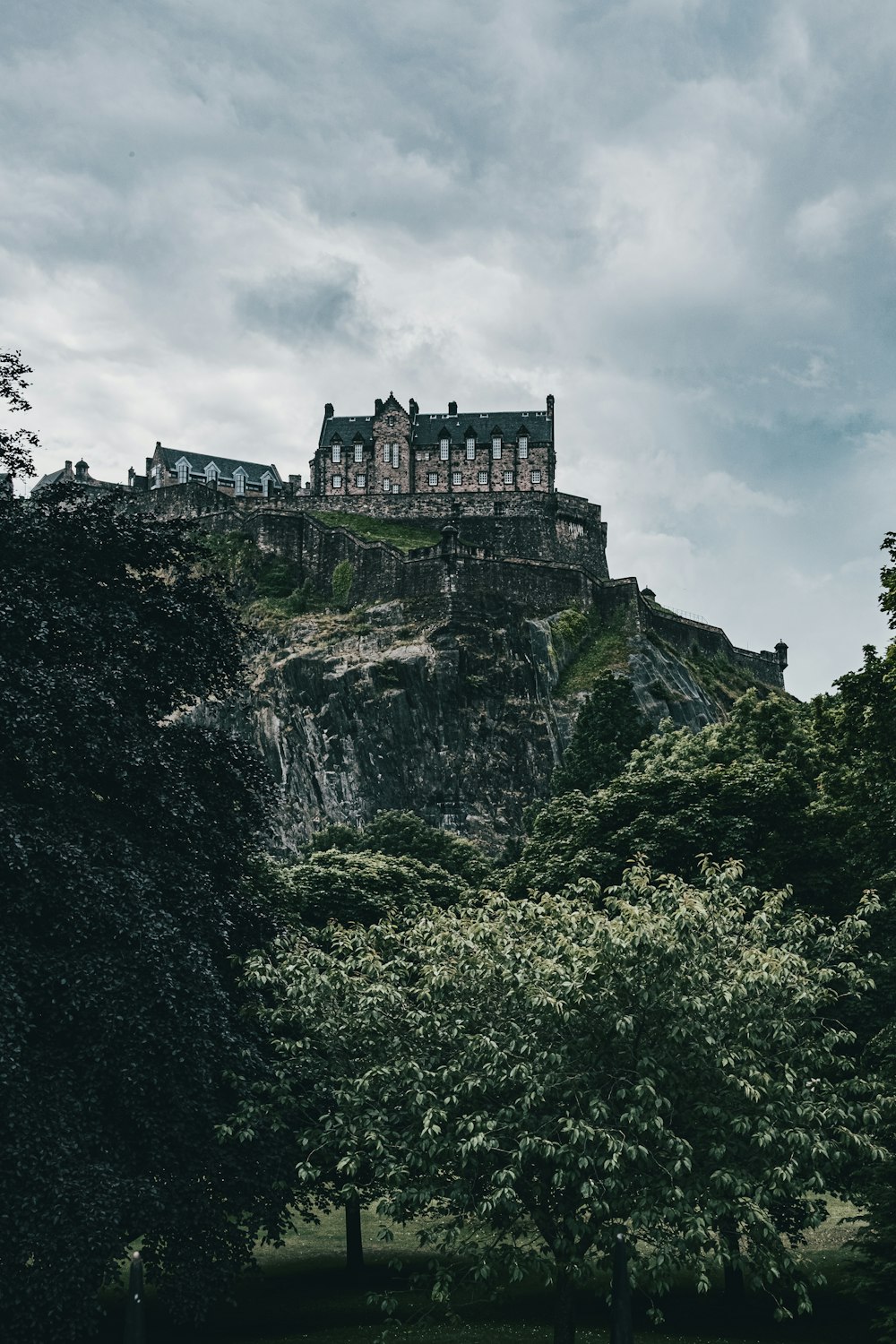 gray concrete castle on top of mountain