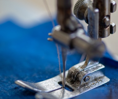 blue and silver sewing machine