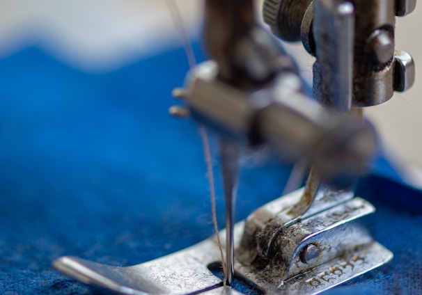 blue and silver sewing machine