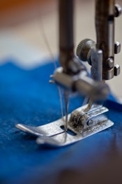 blue and silver sewing machine