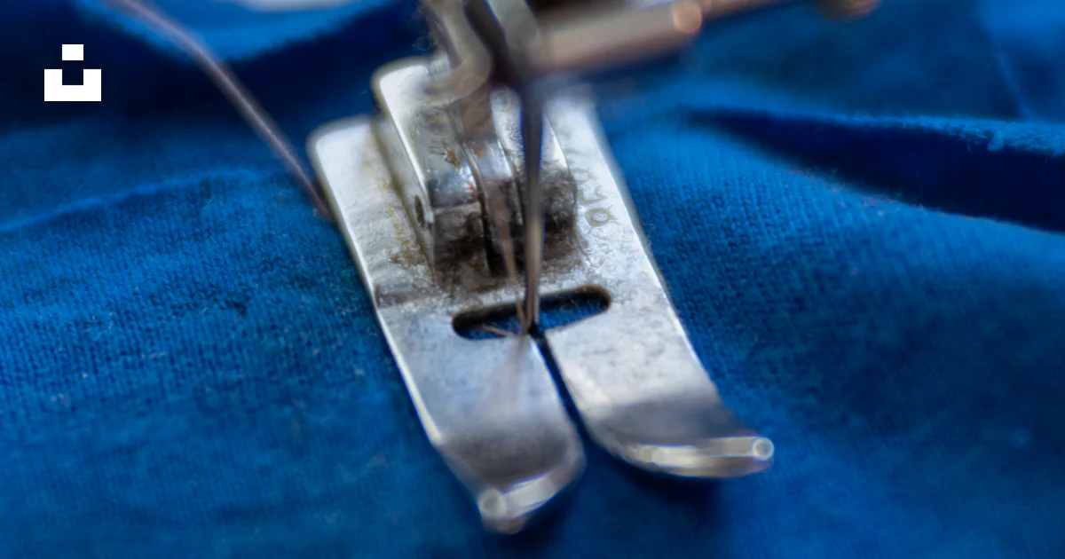 Silver sewing machine on blue textile photo – Free Work Image on Unsplash
