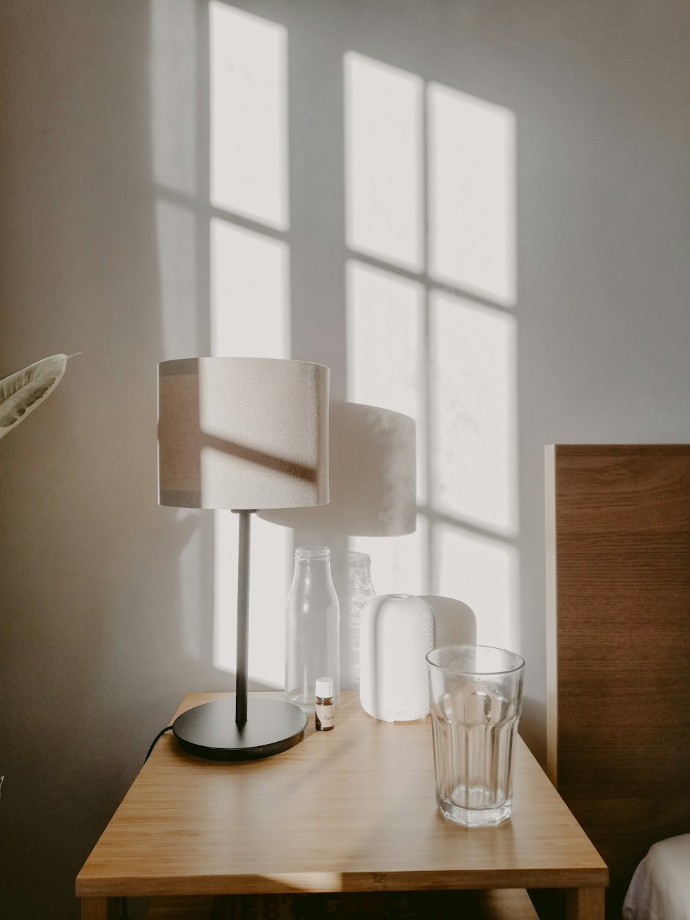 white table lamp on brown wooden table