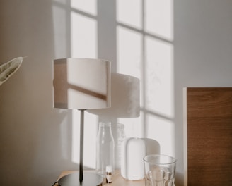 white table lamp on brown wooden table