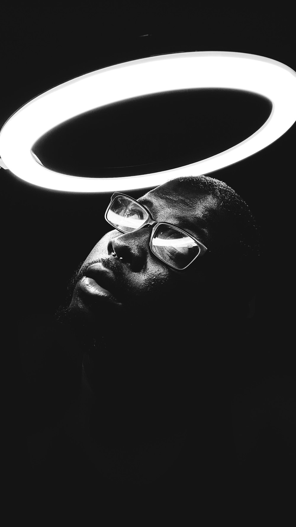 man wearing black framed eyeglasses