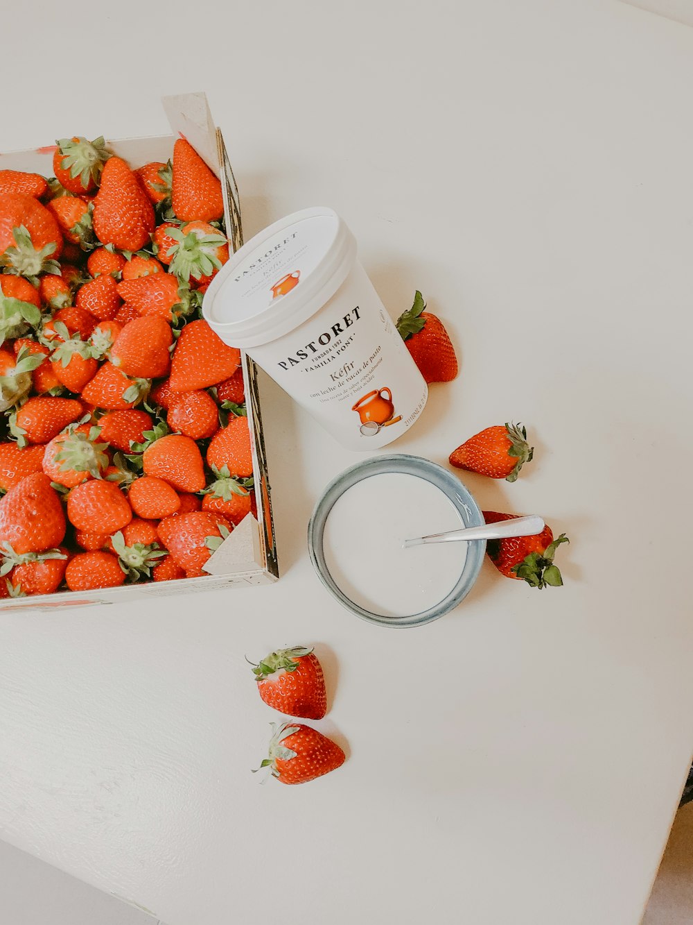 strawberries on white plastic cup