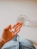 person holding white medication pill