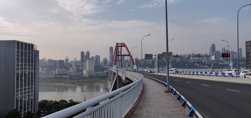 white metal bridge over river