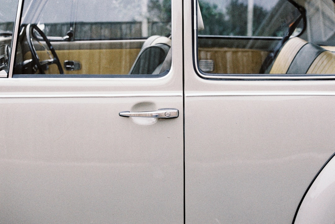 white car door with glass