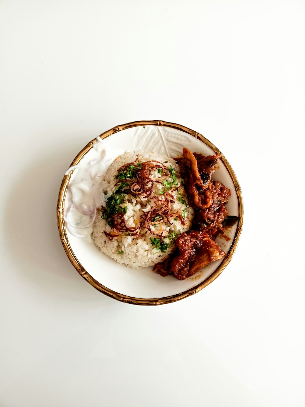 cooked food on white ceramic bowl