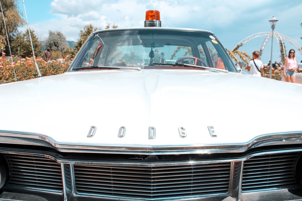 white mercedes benz car on road during daytime