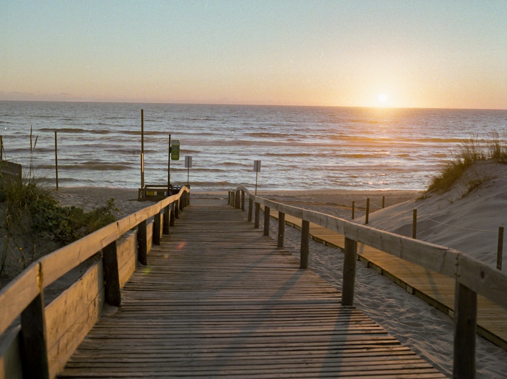 brown wooden dock on sea during daytime