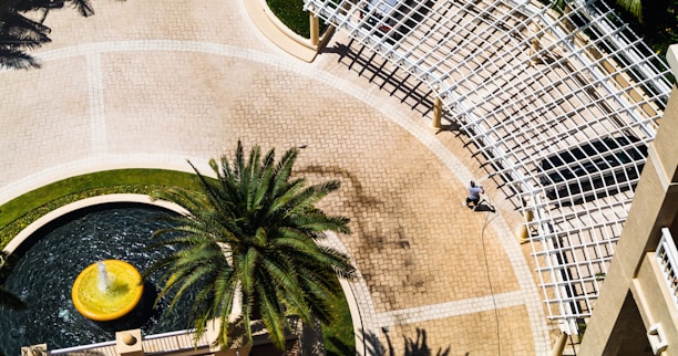 people walking on white concrete building