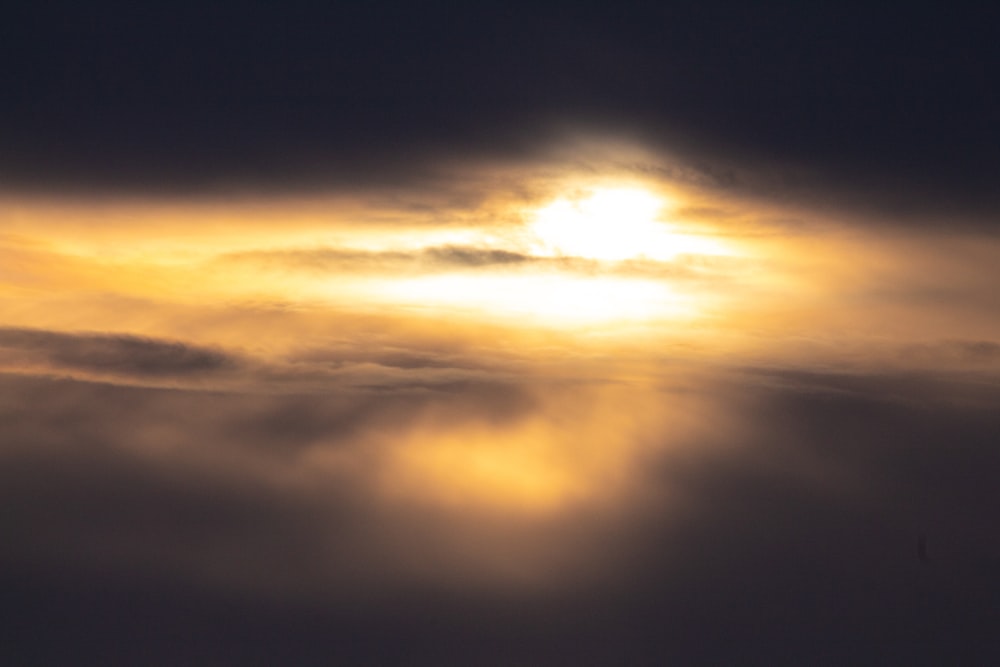 clouds and sun during sunset