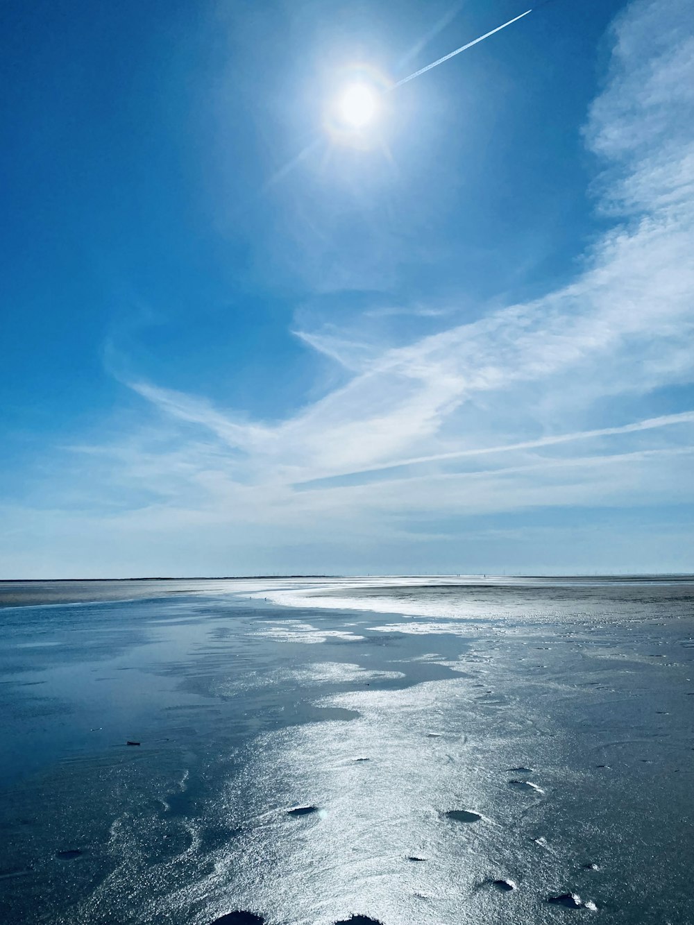 blue sky and white clouds over the sea