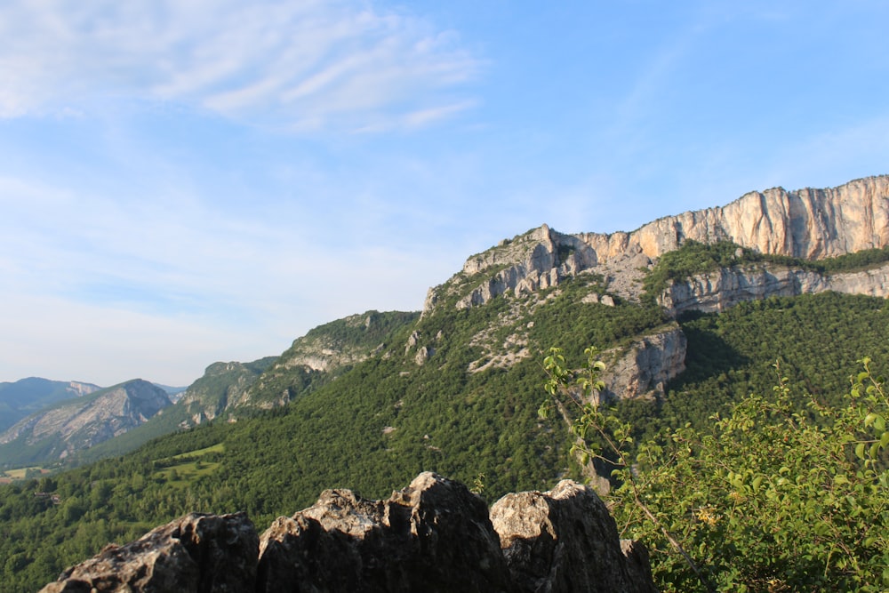 green and brown mountain under blue sky during daytime