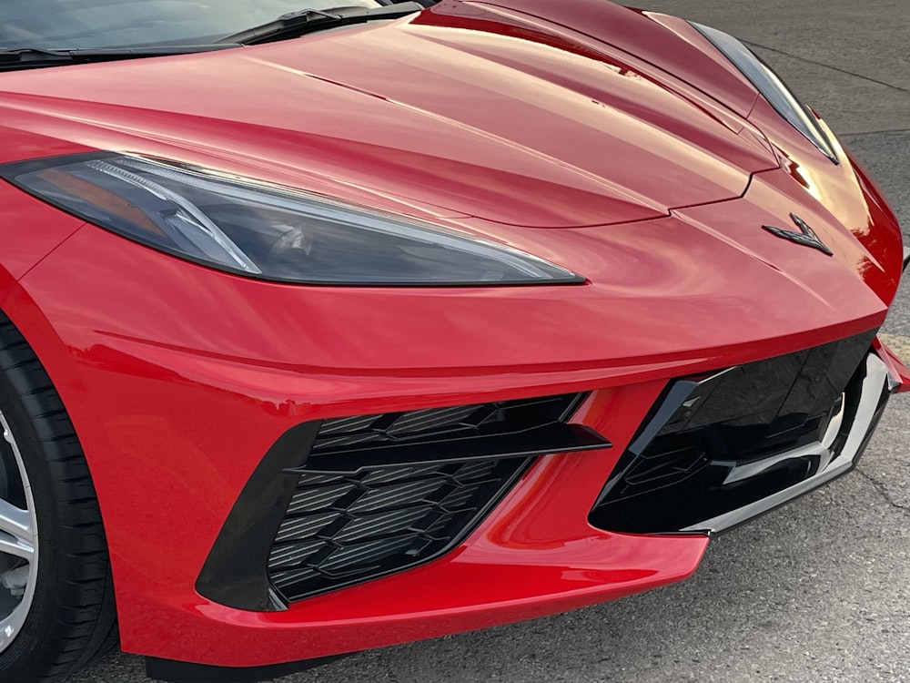 red ferrari car on road