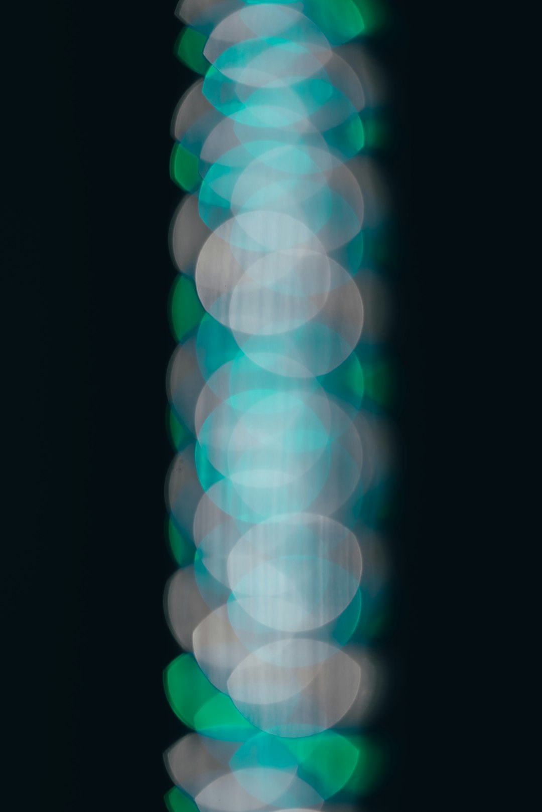 green and white light bokeh