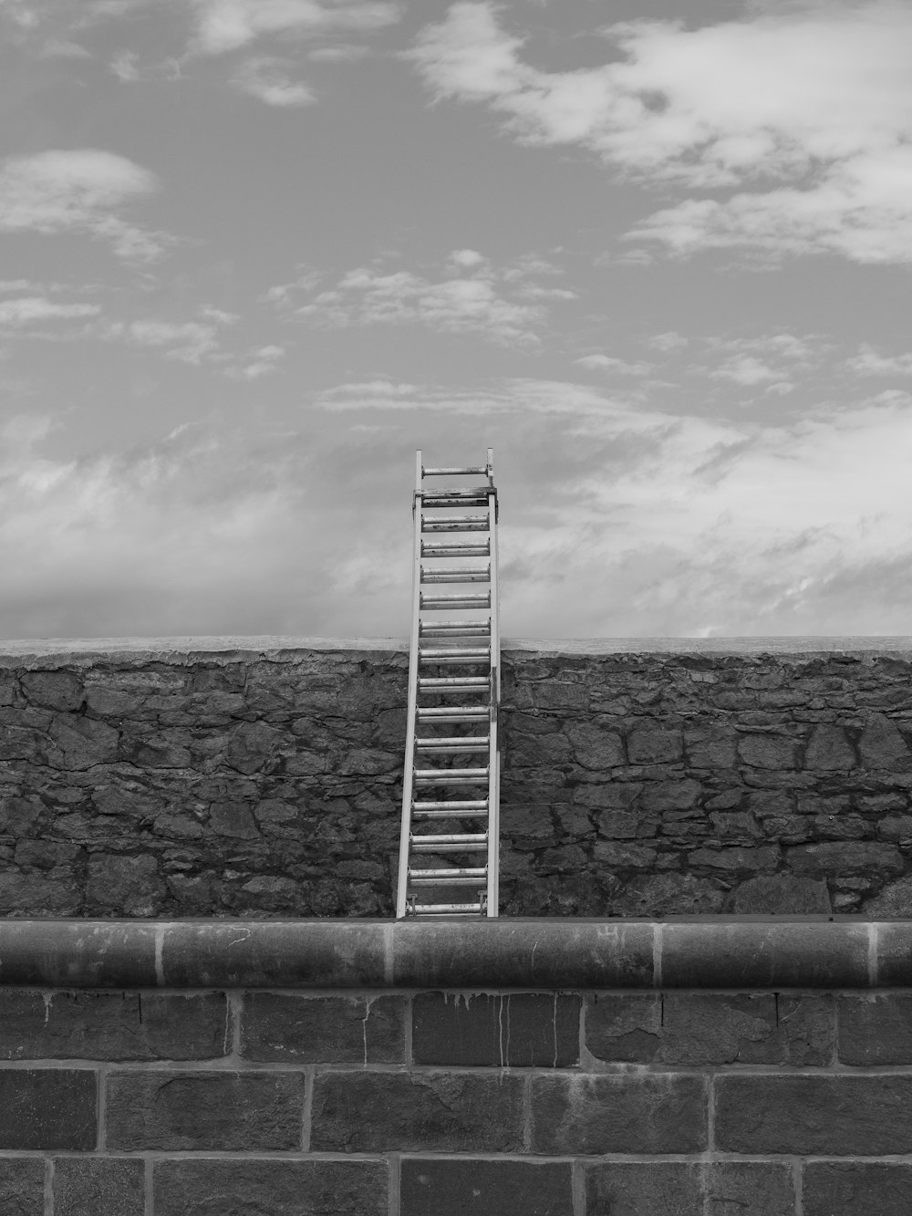 grayscale photo of concrete wall