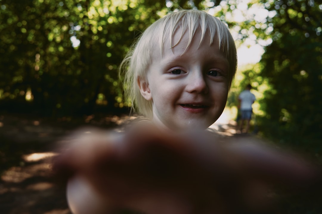 smiling girl in white shirt