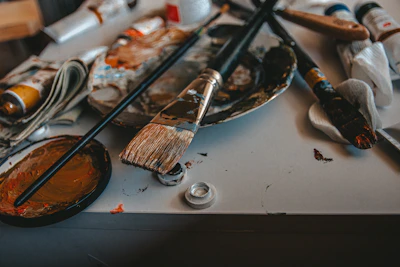 brown paint brush on white table