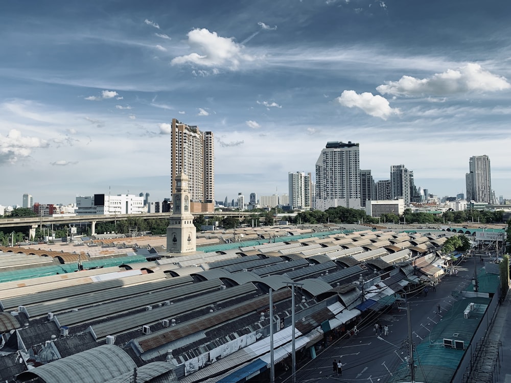 city buildings under blue sky during daytime