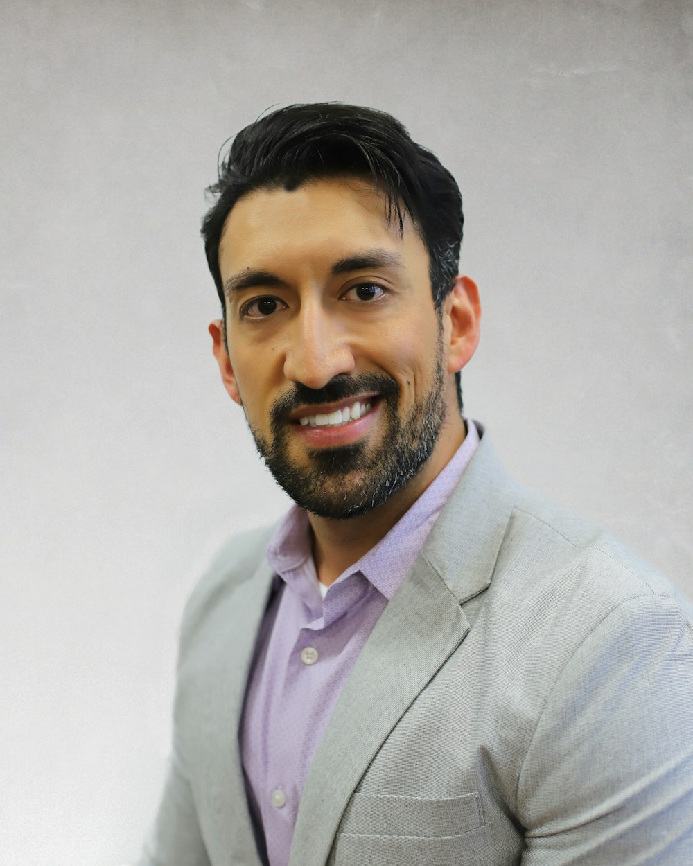 man in gray suit jacket