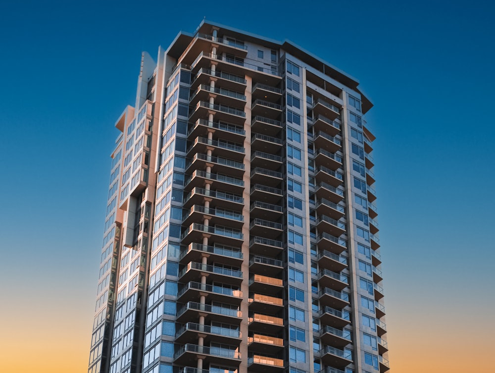 white and brown concrete building under blue sky during daytime