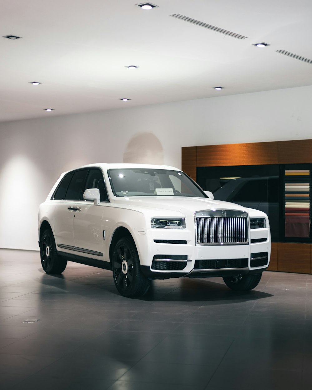 white suv in a garage