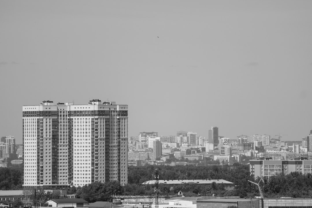 city skyline under white sky during daytime