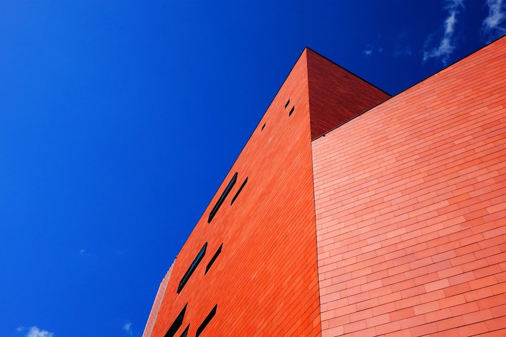 brown concrete building under blue sky during daytime