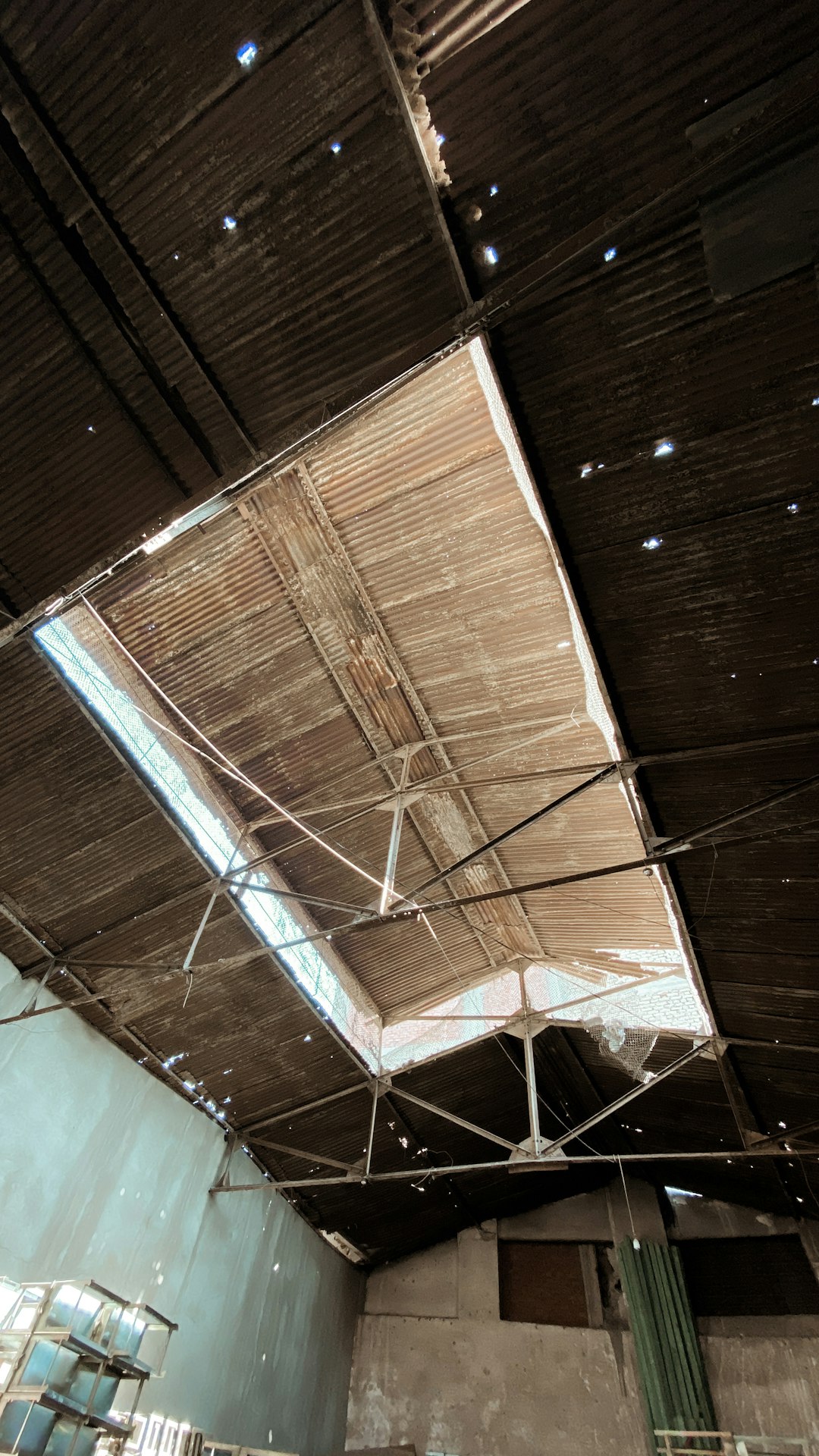 brown wooden ceiling with white string lights