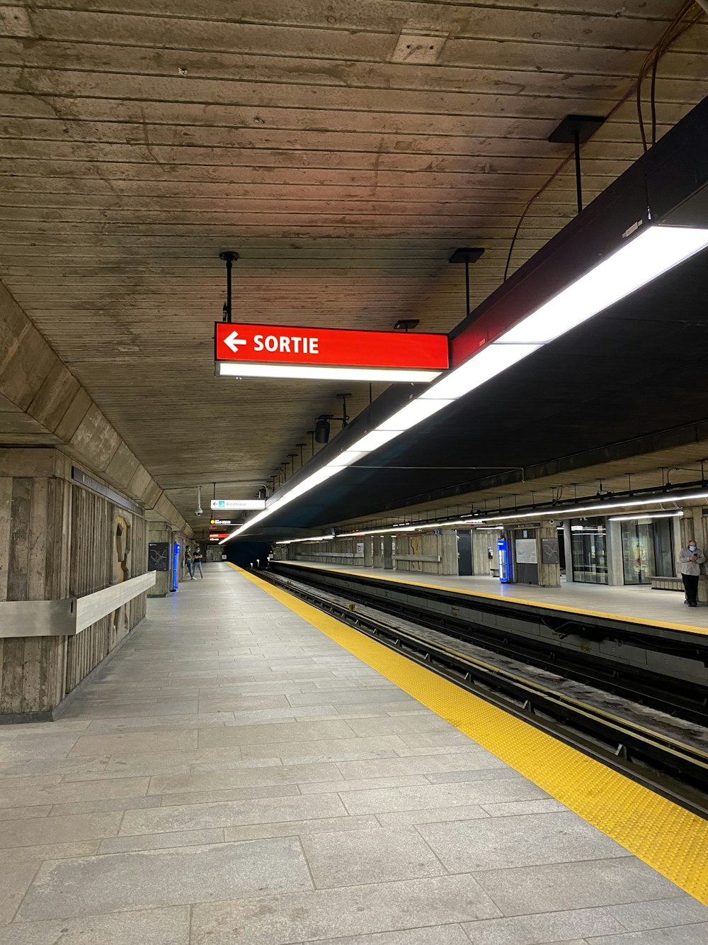 red and white train station