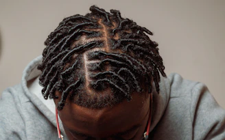 Loc maintenance retwist on Black man mobile loc specialist Essex & Dagenham