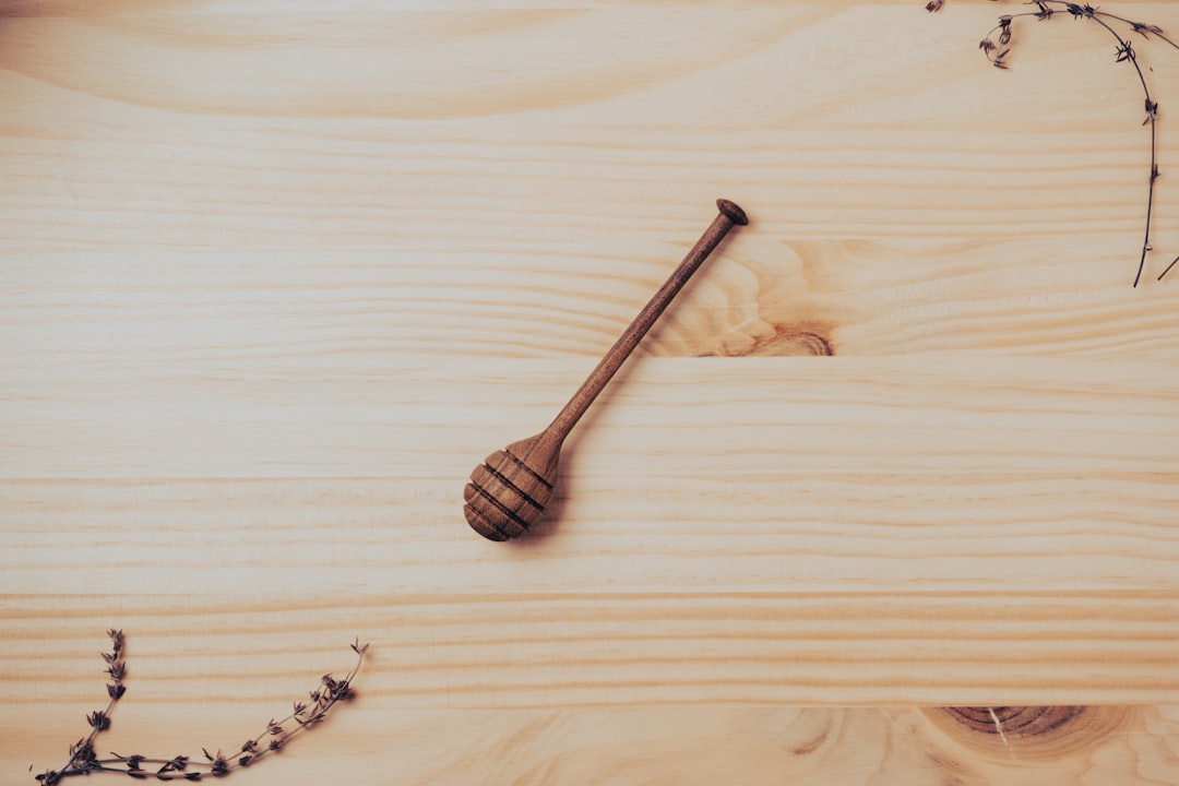 brown wooden stick on brown wooden table