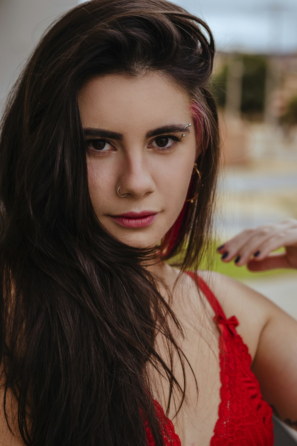 woman in red sleeveless top