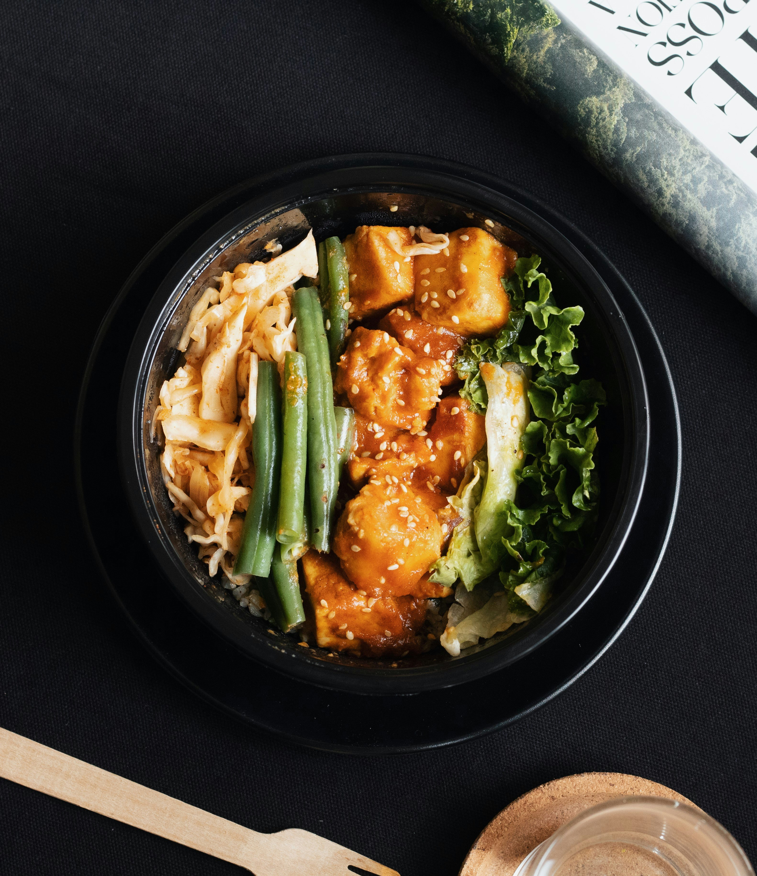 vegetable salad on black ceramic bowl