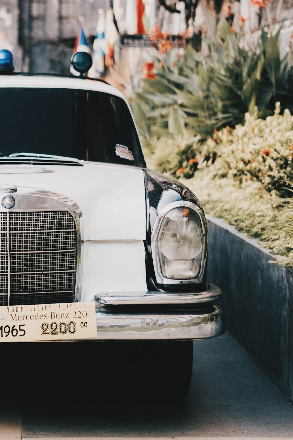 white mercedes benz car in grayscale photography