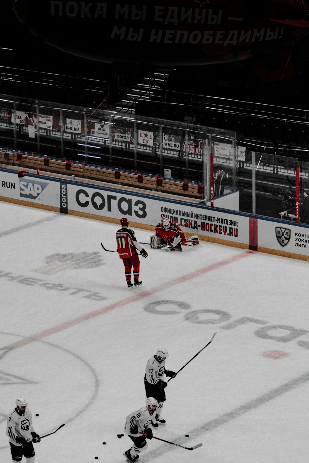 ice hockey players on ice hockey field