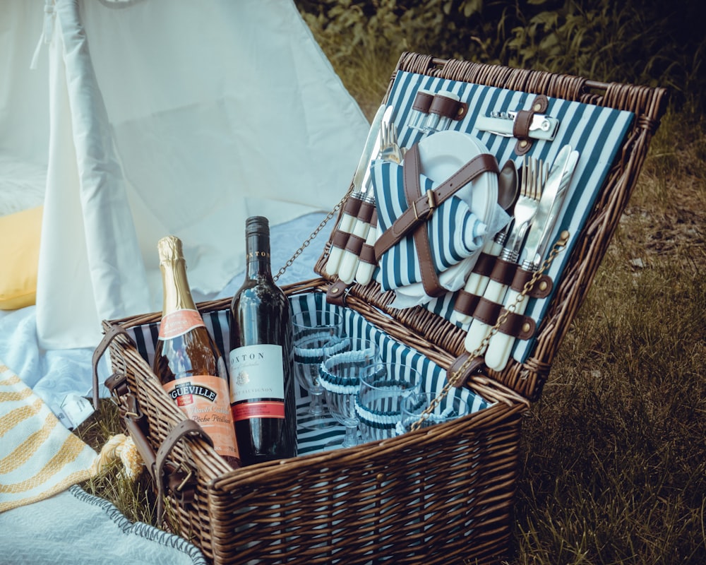 wine bottles in brown woven basket