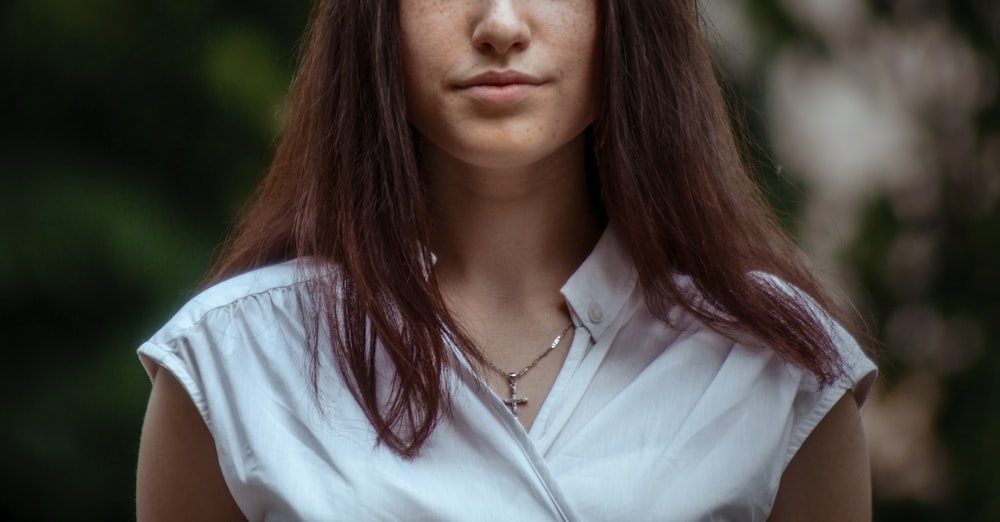 woman in white button up shirt