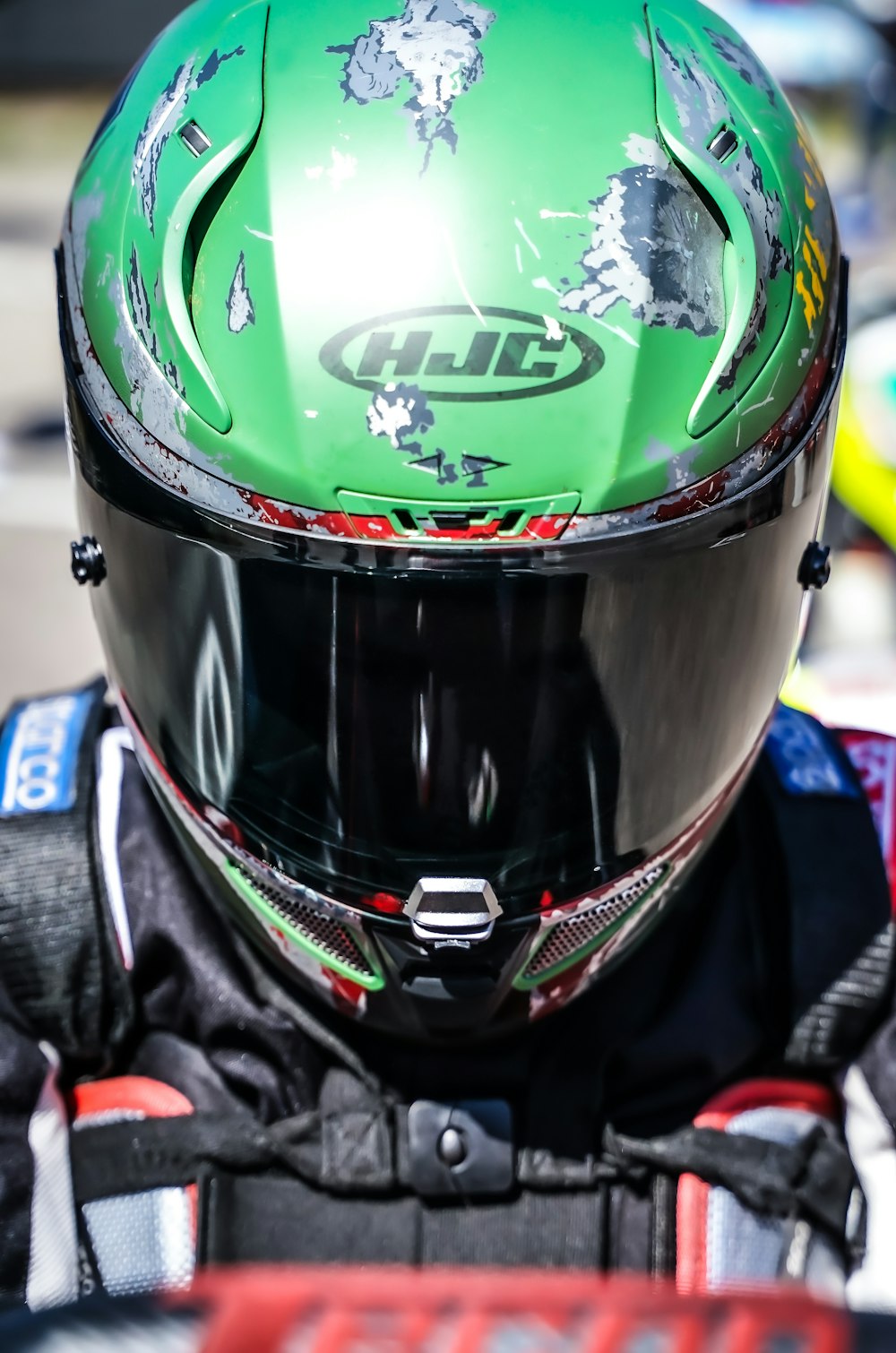 a close up of a person wearing a helmet