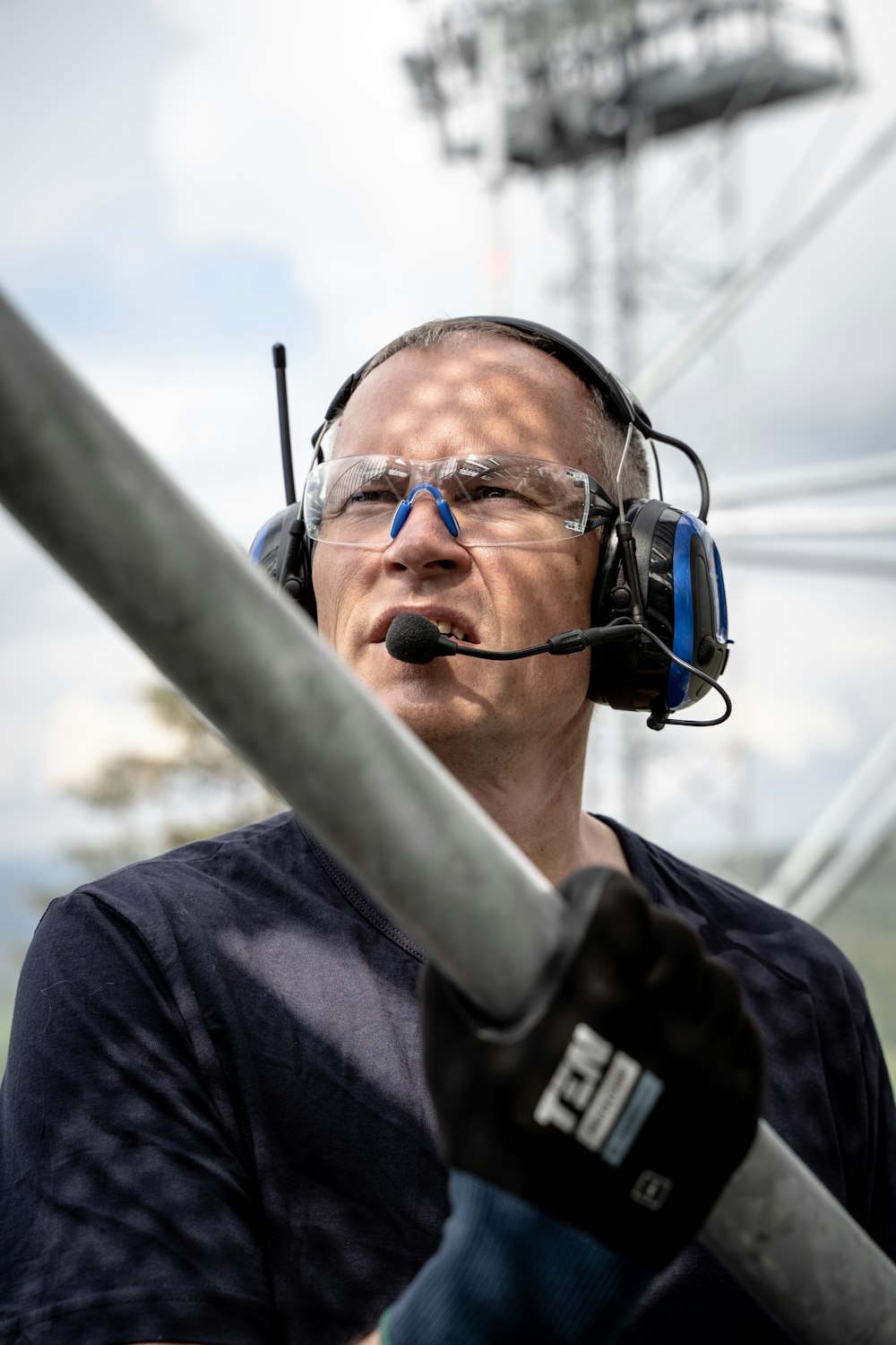 a man wearing headphones and a microphone