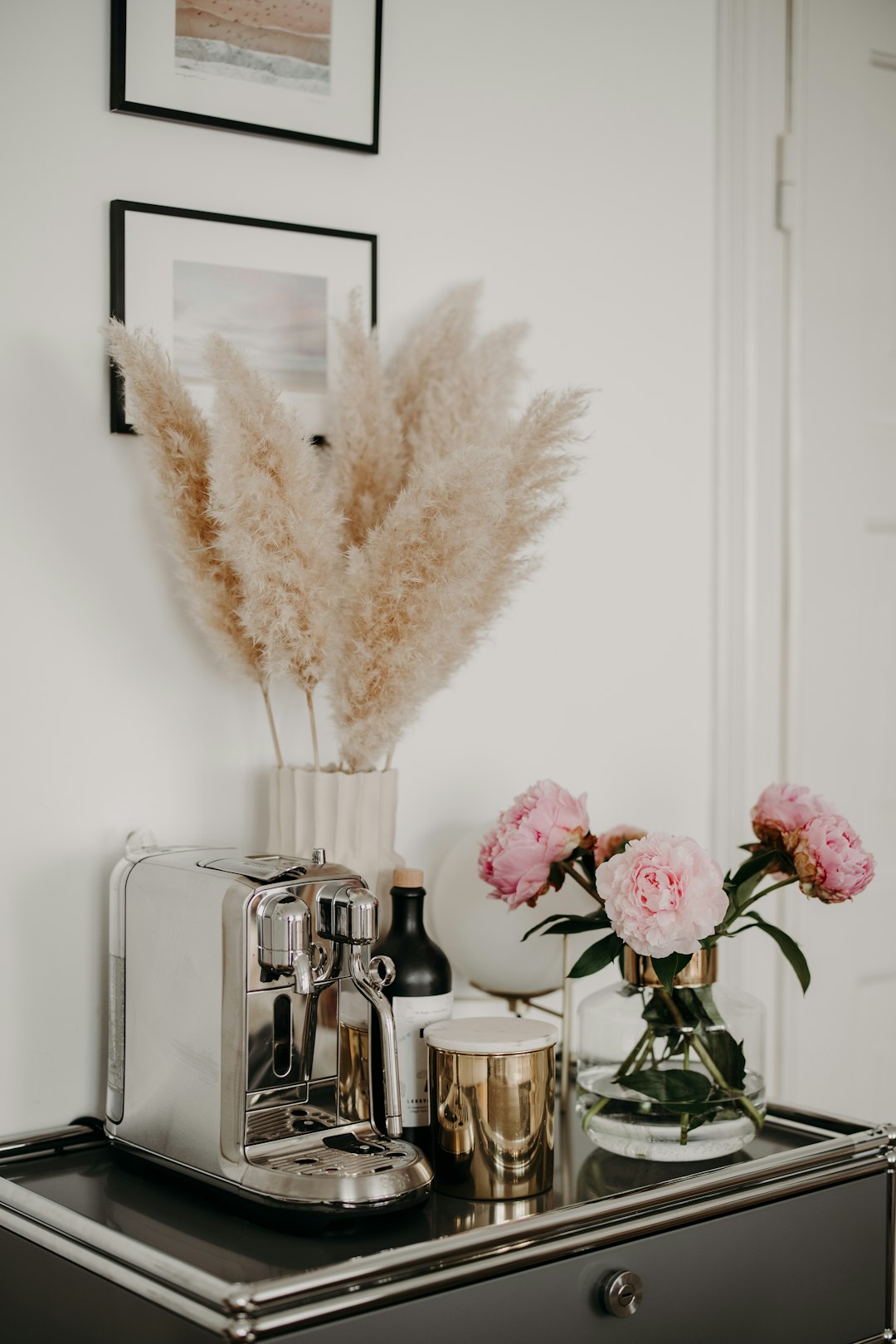 pink flowers in clear glass vase