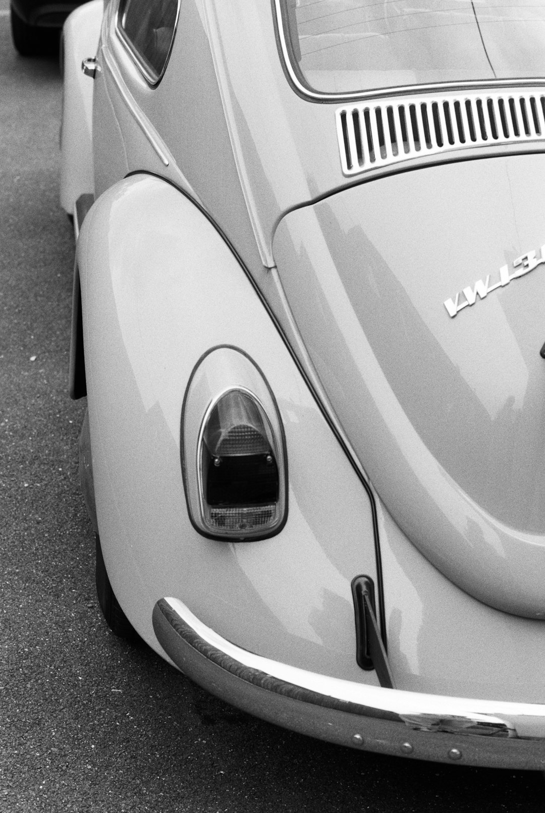 grayscale photo of car on road