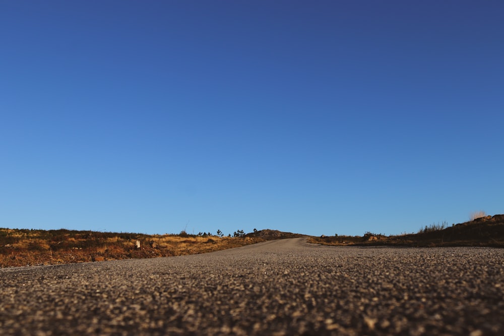 brown sand under blue sky during daytime