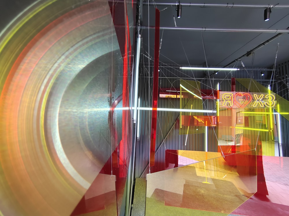 red and yellow hallway with glass doors