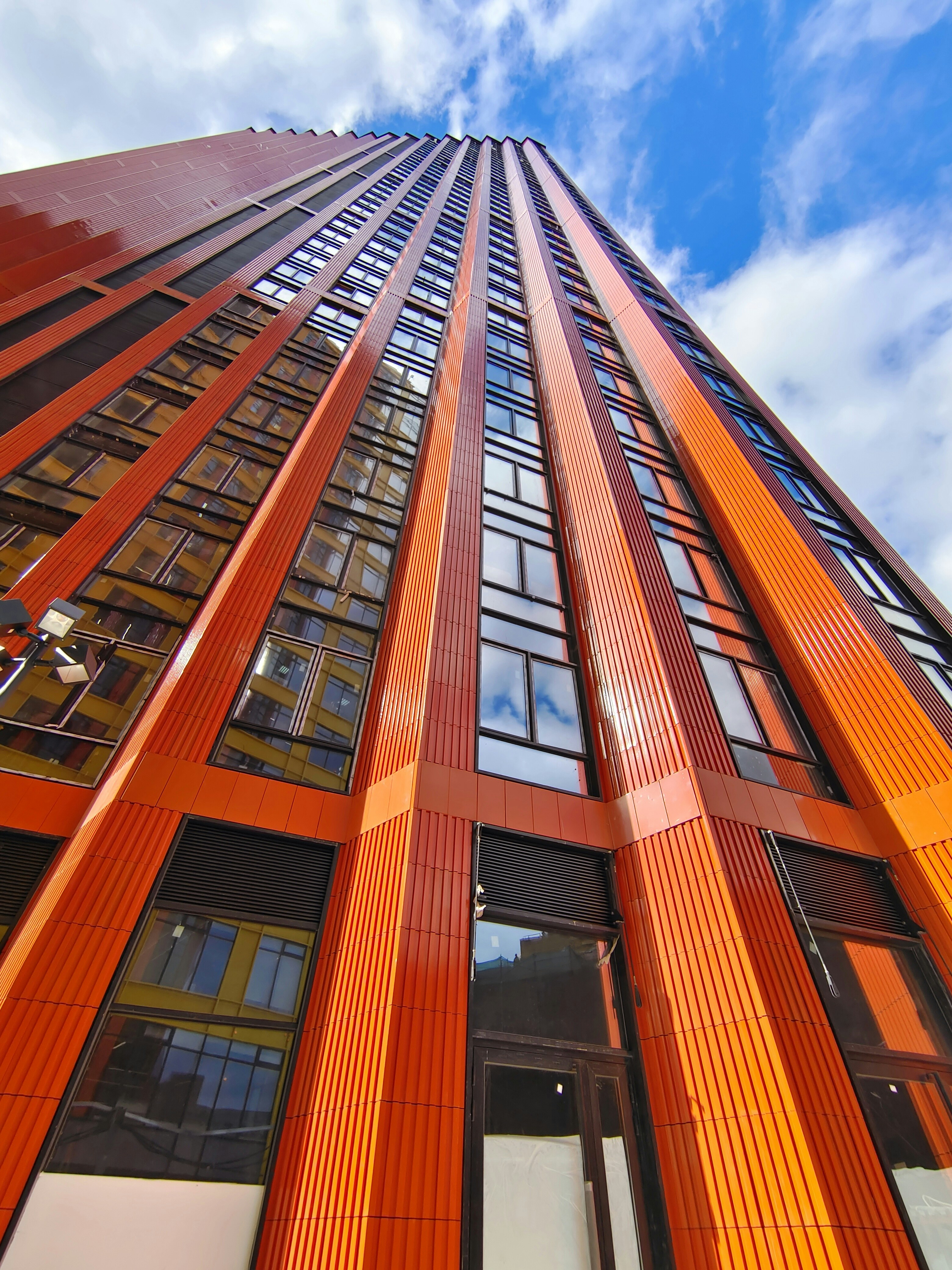 brown concrete building under blue sky during daytime